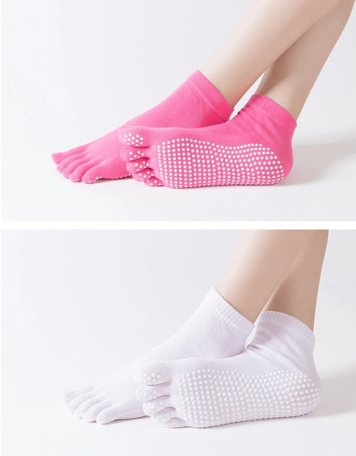 Pink and white non-slip quick-drying women's five-toe socks for yoga and sports.